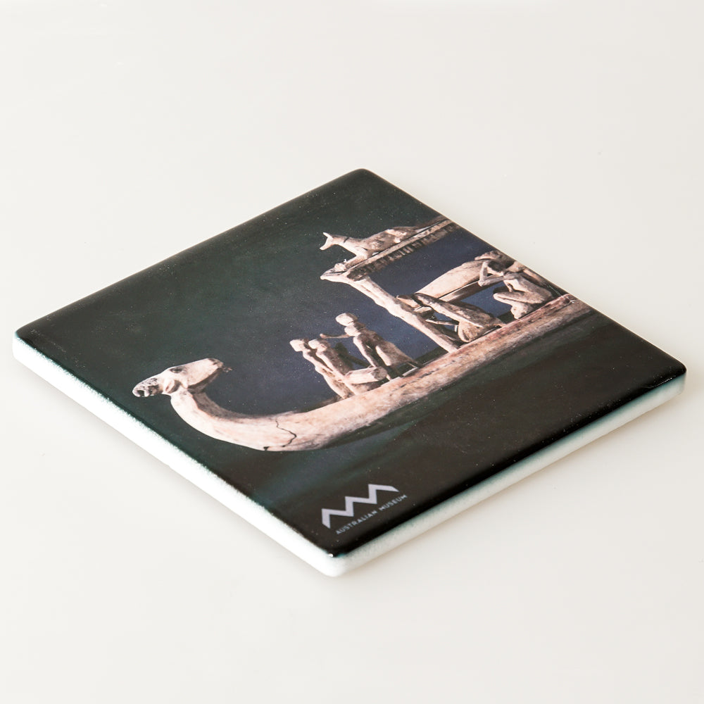 Ceramic coaster featuring carved funerary boat, shown in the 200 Treasures of the Australian Museum exhibition